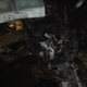 A photo of a crushed Lamborghini outside an LA mansion.